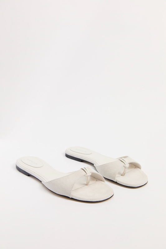 The Chiara Sandal in cream Avorio Suede. Italian handcrafted with LWG-certified materials, a rounded toe, and padded insoles for all-day comfort. A luxury staple.