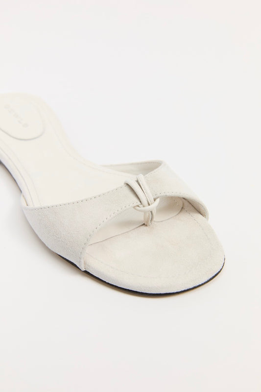The Chiara Sandal in cream Avorio Suede. Italian handcrafted with LWG-certified materials, a rounded toe, and padded insoles for all-day comfort. A luxury staple.